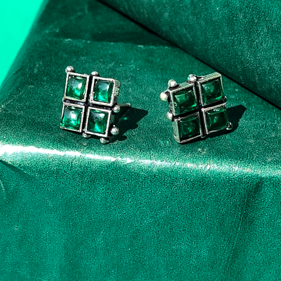 WHISPERING RED STUDS