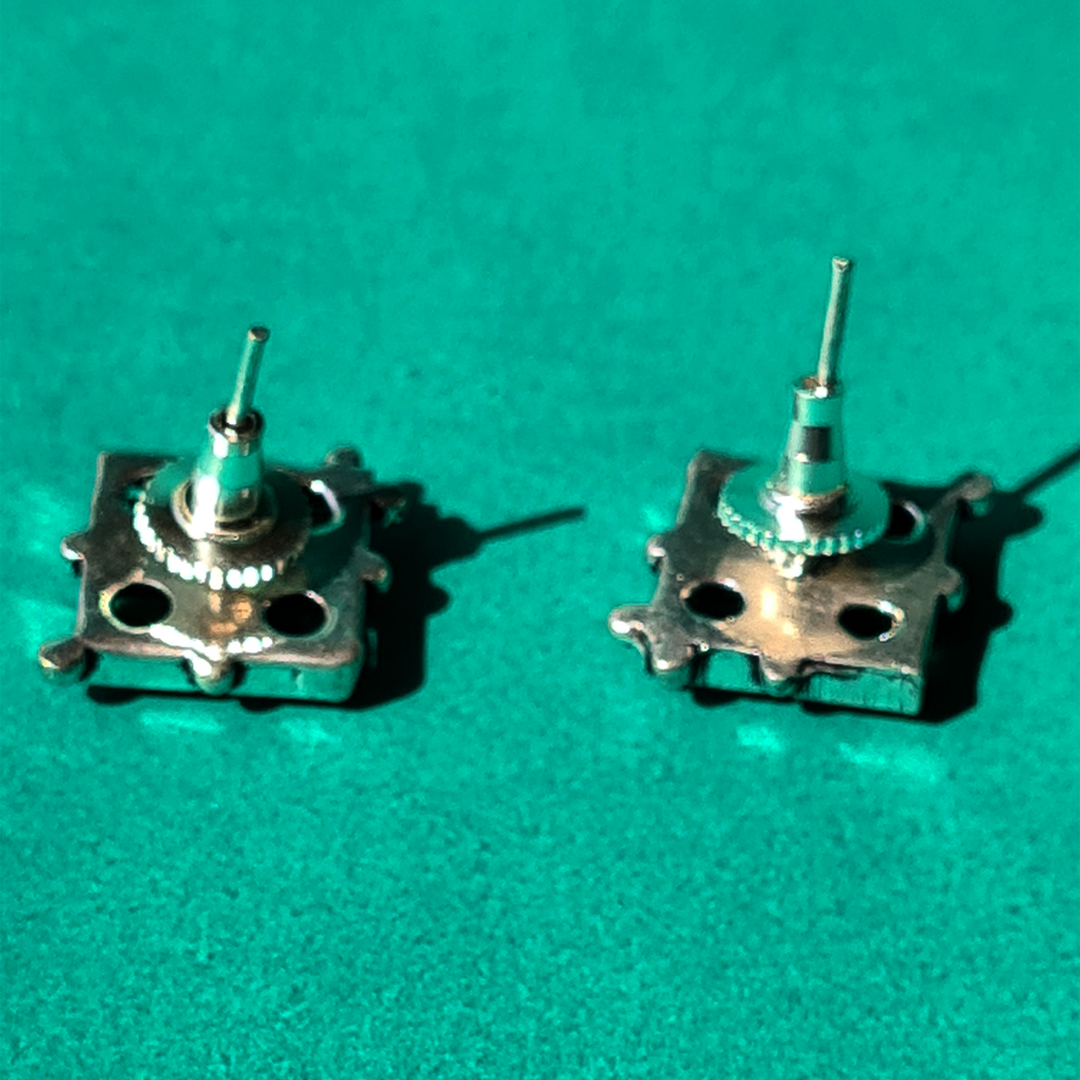 WHISPERING RED STUDS