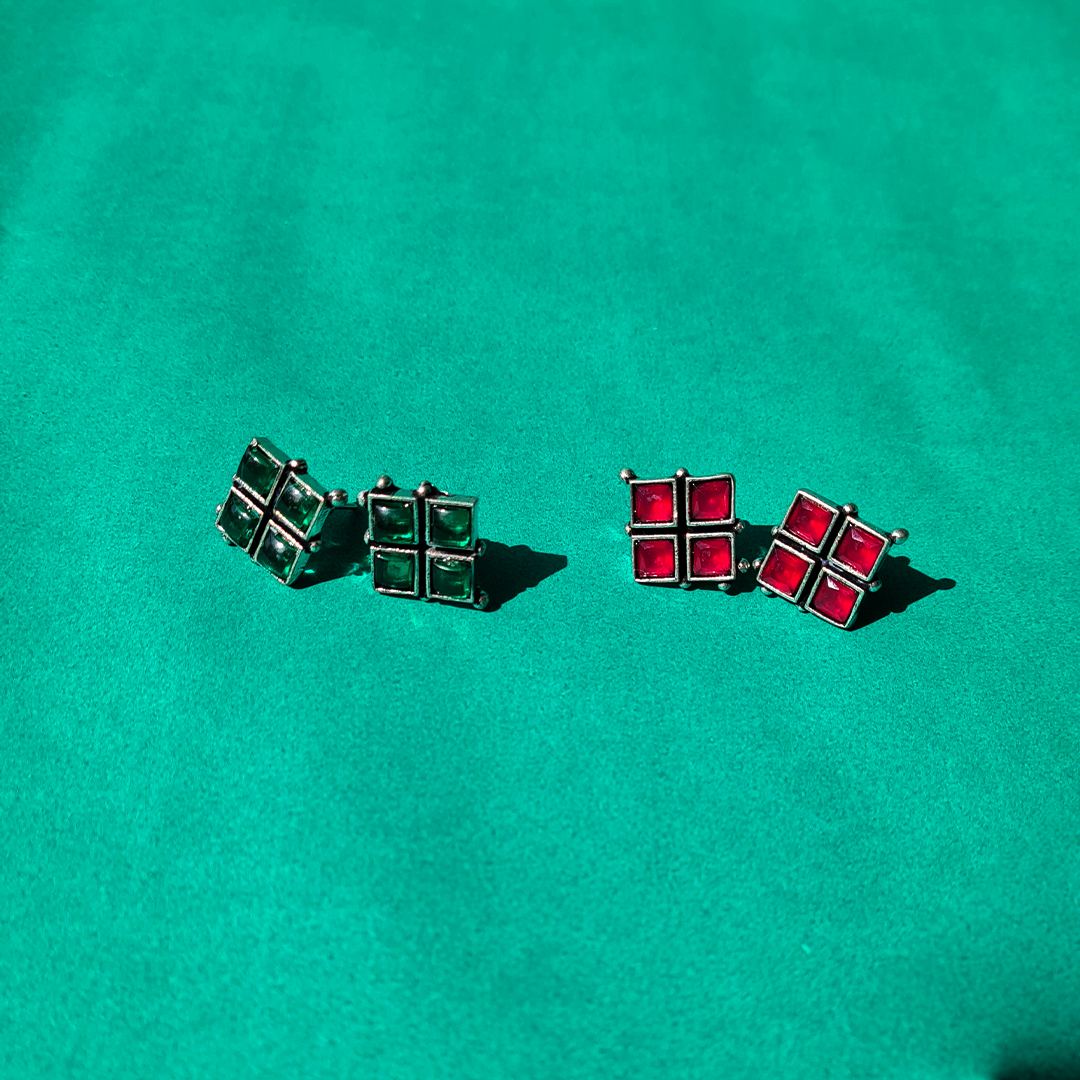 WHISPERING RED STUDS