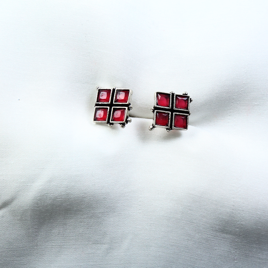 WHISPERING RED STUDS