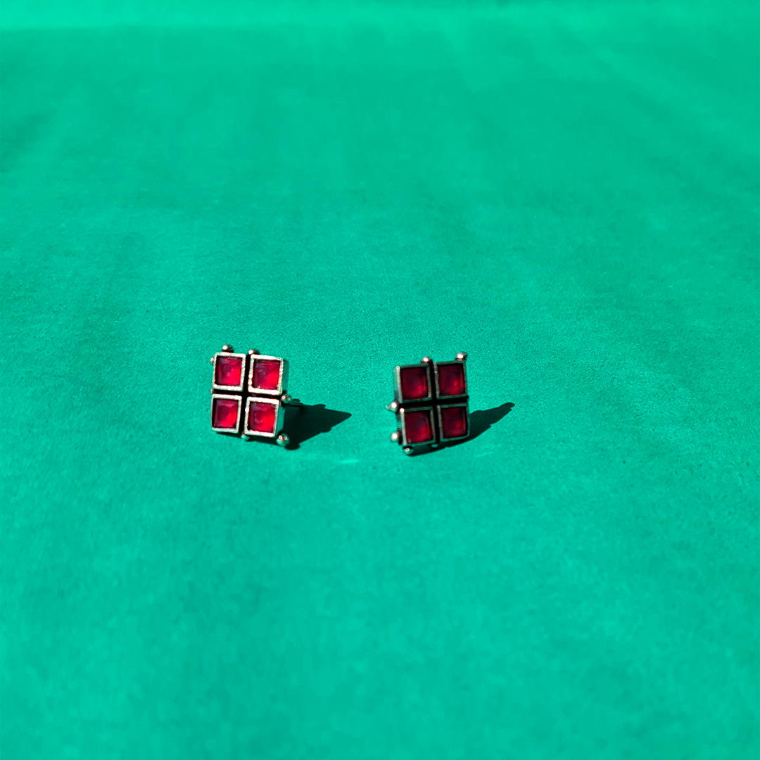 WHISPERING RED STUDS