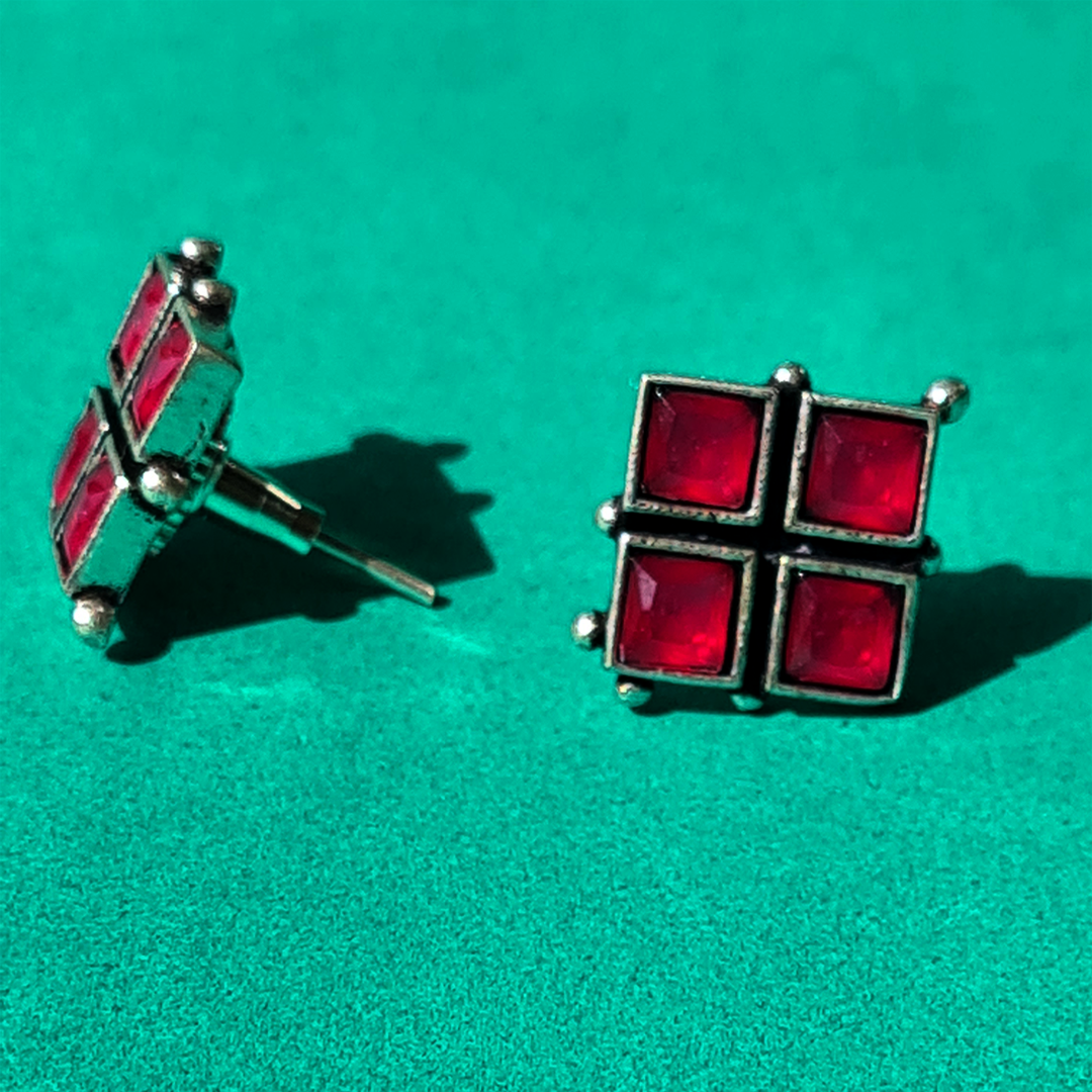 WHISPERING RED STUDS